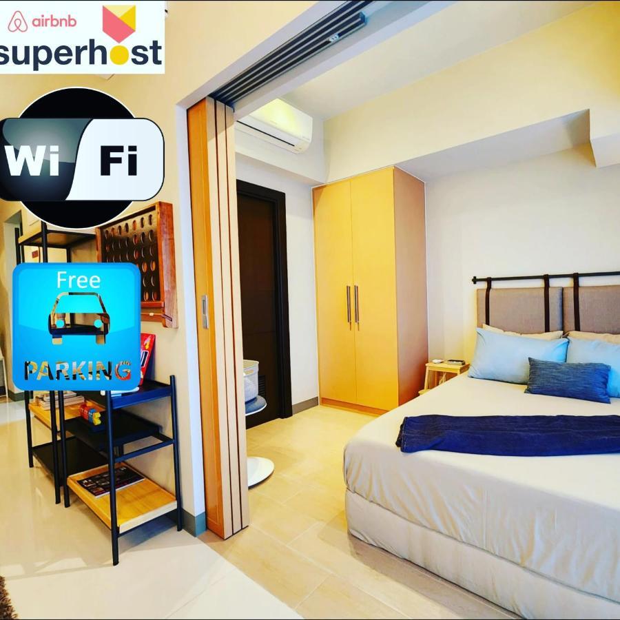 Spacious 7U Homey Unit Steps Away From Uptown Mall And Mitsukoshi Mall Free Parking With Washer Manila Bagian luar foto